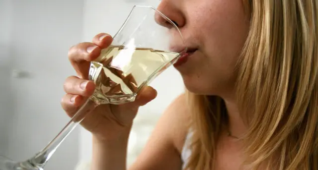 Anonymous women drinking wine