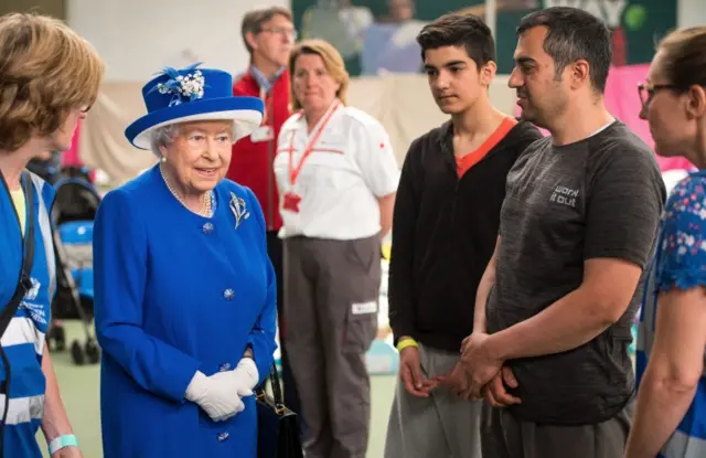 Queen Elizabeth II meets members of the community affected by the Grenfell Tower disaster during a visit to the Westway Sports Centre