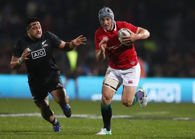 Jonathan Davies of the Lions makes a break