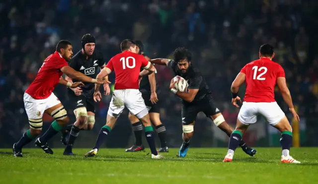 Akira Ioane of the Maori All Blacks takes on the Lions