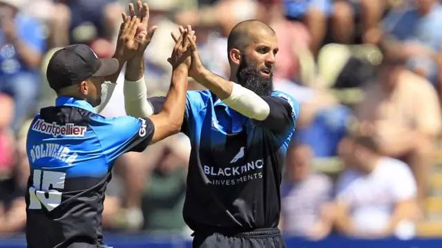 Moeen Ali (right)