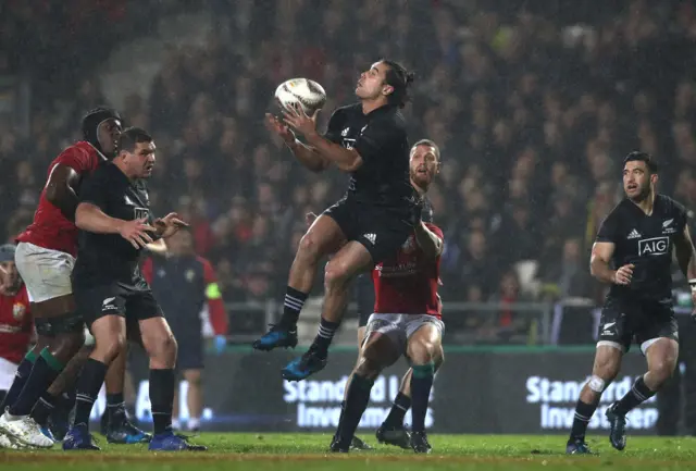 James Lowe of the Maori All Blacks fumbles a hgh ball