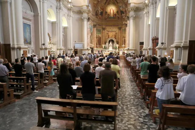 A moment of the prayer vigil for Gloria Trevisan and Marco Gottardi, the two Italians who died in the fire at the Grenfell Tower of London (Britain), in the church of Camposampiero, near Padua, 16 June 2017.