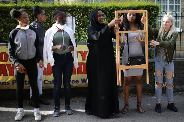 Volunteers distribute aid near Grenfell Tower in West London