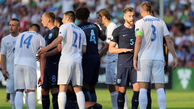 Tempers flare after Milan Skriniar of Slovakia catches Tammy Abraham of England