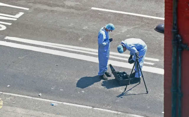 Forensic officers at the scene