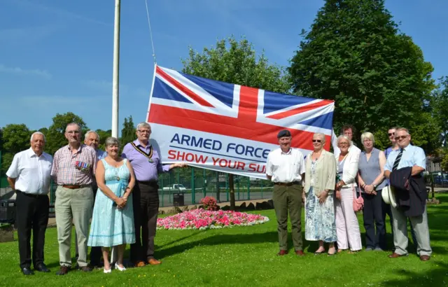 Flag being raised