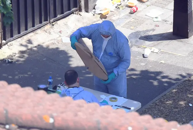 Forensic officers at the scene