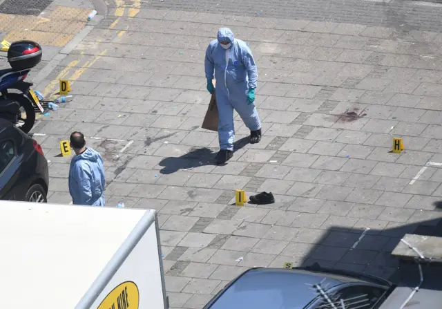 Forensic officers at the scene