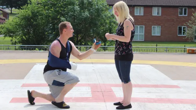 Paul Price proposing on helipad