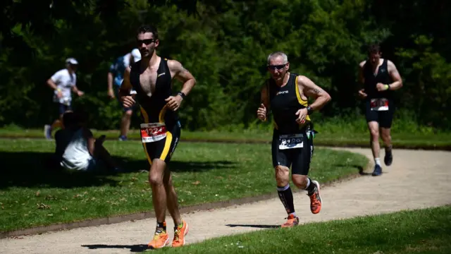 Participants run in the IRONMAN 70.3 Staffordshire