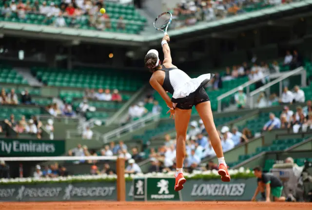 Garbine Muguruza serves