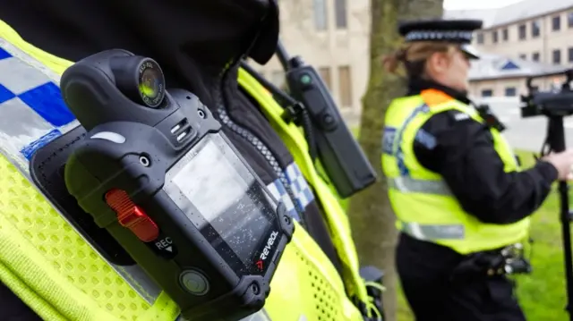 Police officer wearing body camera