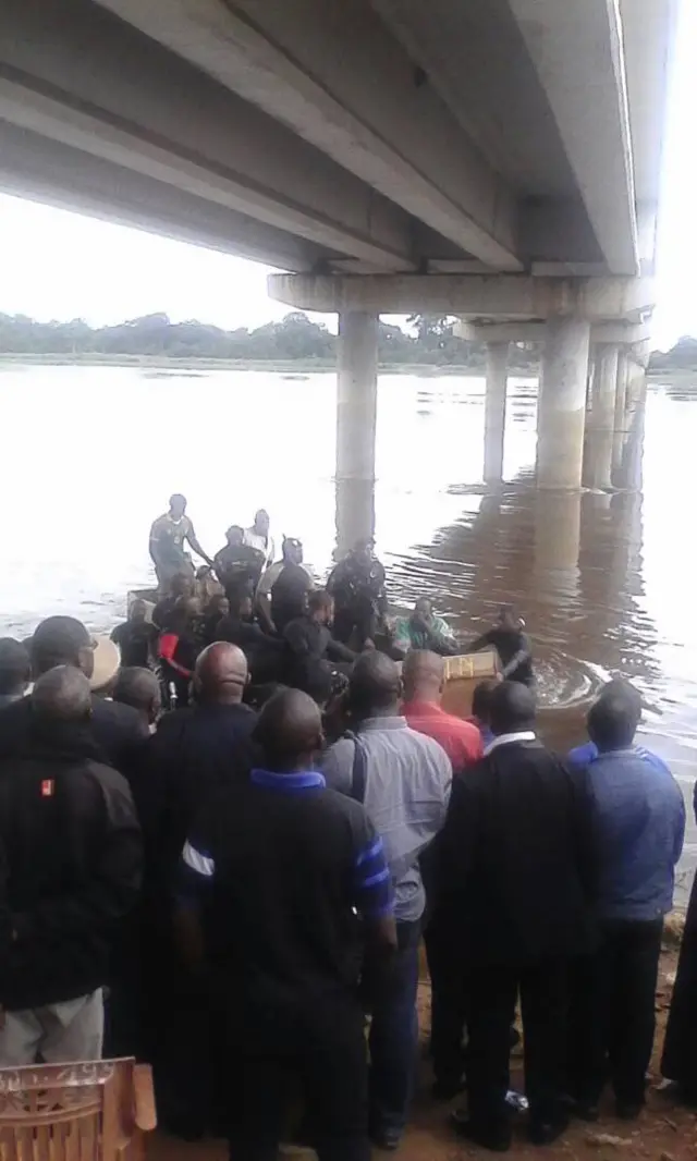 Crowd at banks of river