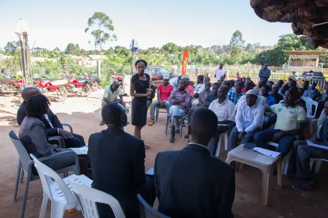 Barefoot Law's Joy Birabwa talks to boda-boda operators in Kampala on 19th May 2017