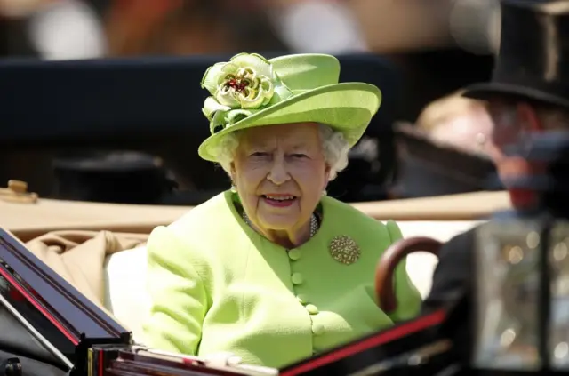 The Queen in a green hat