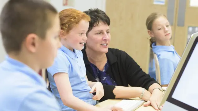 Teacher with pupils