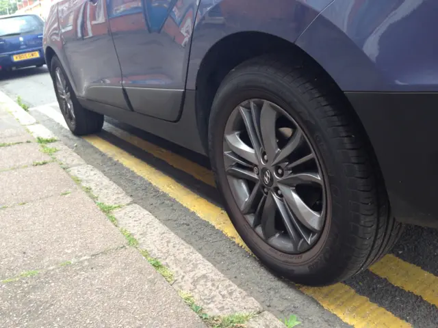 Car on double yellow lines