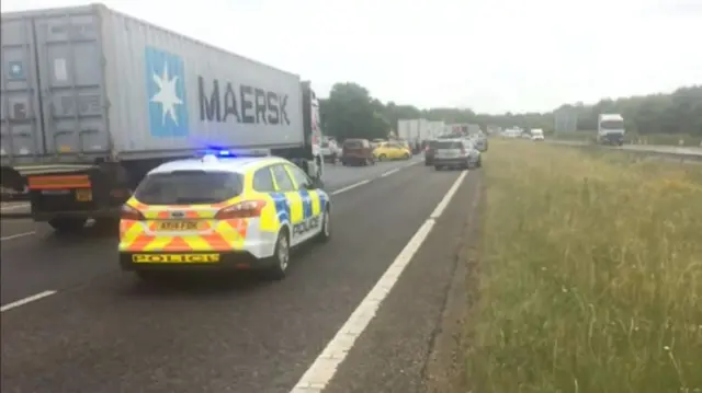 Van and trailer overturn on A14 at Claydon