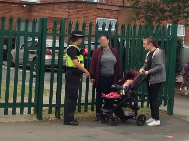 Parents speaking to police outside the school