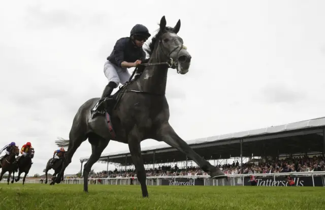 Winter winning the Irish 1000 Guineas at the Curragh