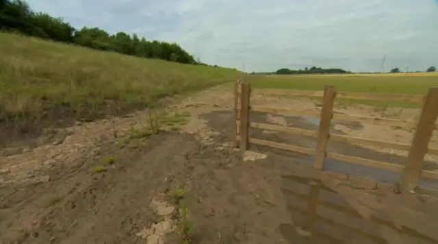Grassland which will become a lagoon if there is excessive rain