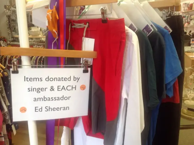 A rail of clothes donated by Ed Sheeran