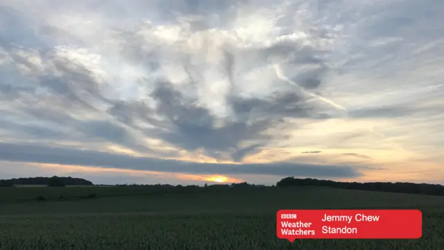 Cloudy formation over a field in Standon.