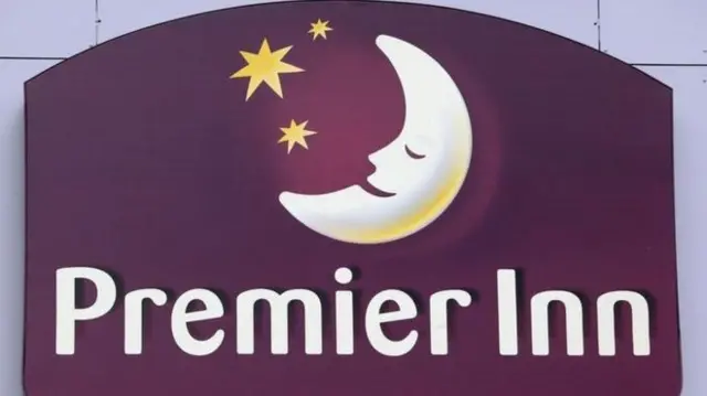 Premier Inn logo on a sign.