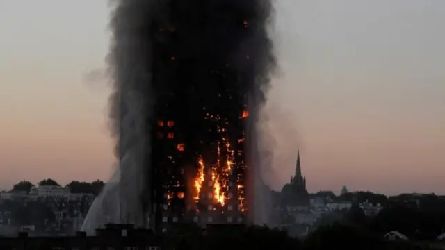 Flames around the Grenfell Tower