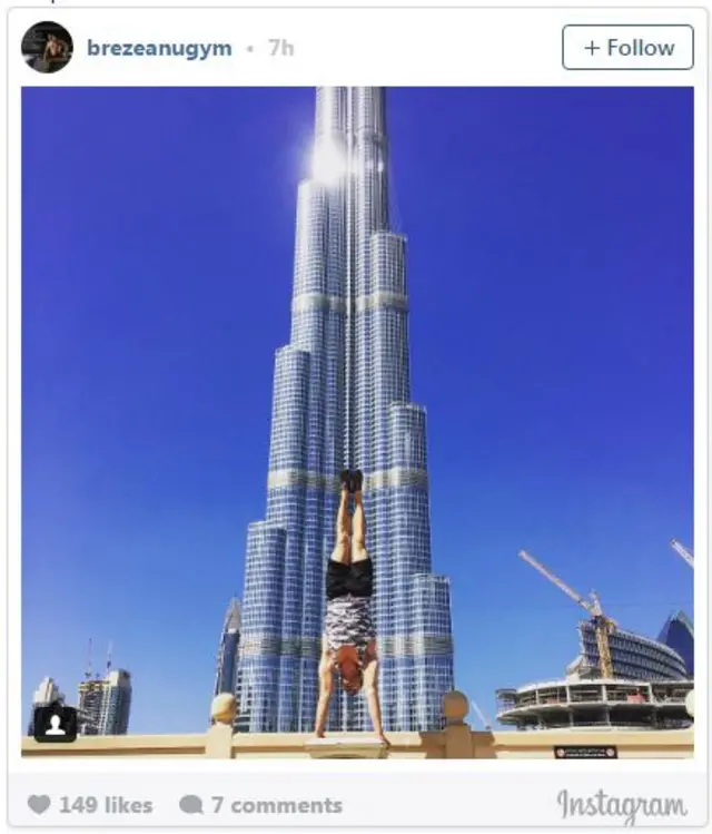 Man doing a handstand in Dubai