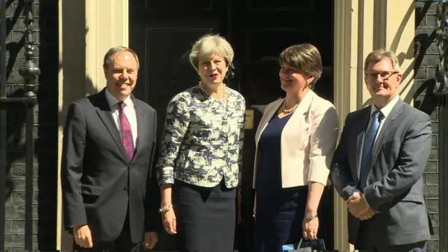 Theresa May with DUP politicians