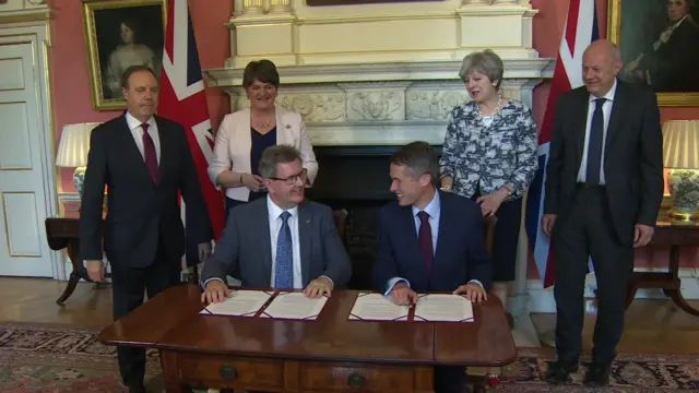 DUP chief whip Sir Jeffrey Donaldson and Conservative chief whip Gavin Williamson