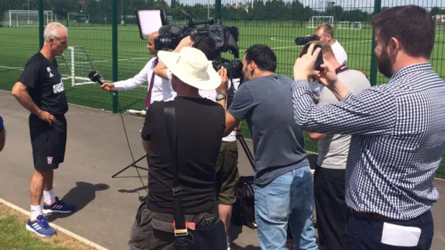 Mick McCarthy talking to the media