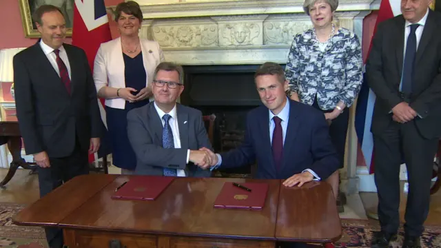 DUP chief whip Sir Jeffrey Donaldson and Conservative chief whip Gavin Williamson