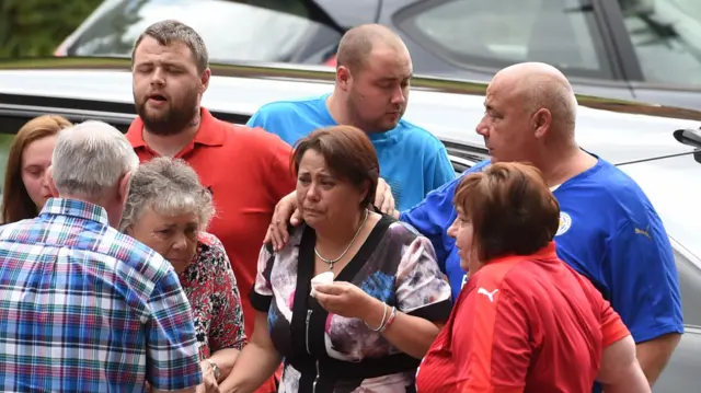 Sally Stokes in tears outside Hinckley church