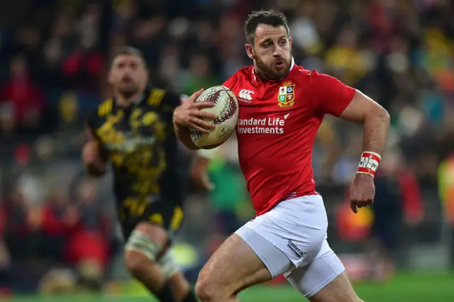 Tommy Seymour runs with the ball