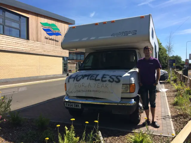 Mr Clarke at the mobile home outside Suffolk Coastal District Council offices