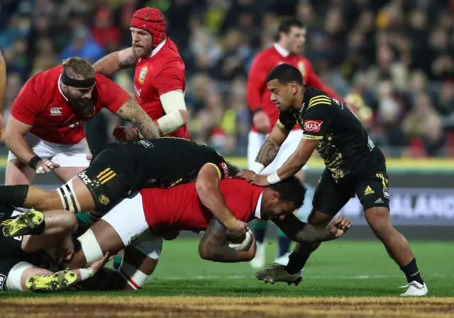 Courtney Lawes is tackled