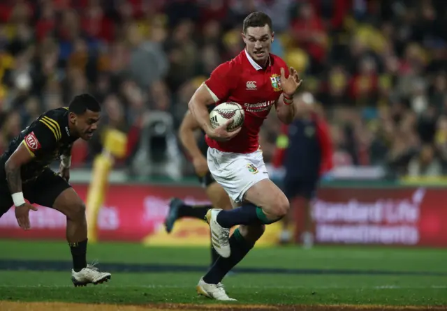 George North runs with the ball