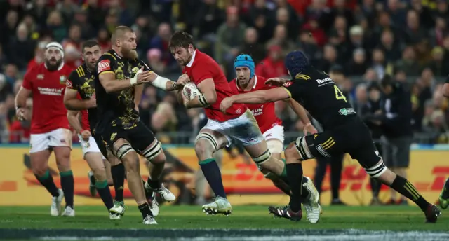 Iain Henderson runs with the ball