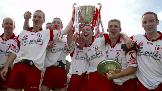 Tyrone players celebrate victory in the 2003 Ulster Final replay