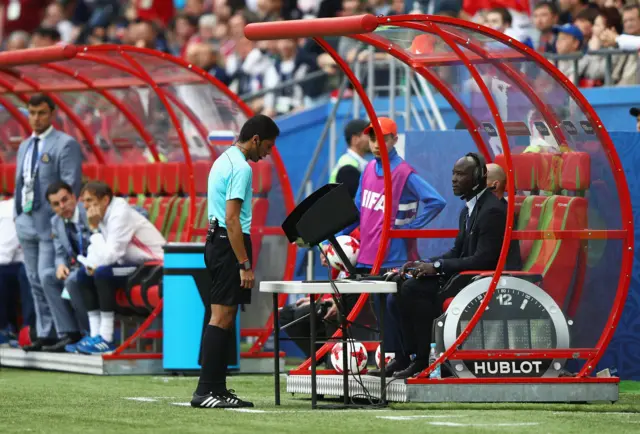 Referee Fahad Al Mirdasi reviewes the VAR footage during the Confederations Cup Russia 2017 Group A match between Mexico and Russia