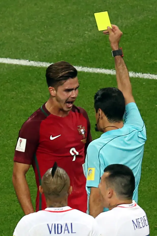 Andre Silva receives a yellow card