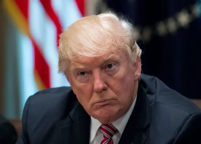 President Donald Trump listens as he meets with immigration crime victims to urge passage of House legislation to save American lives, in the Cabinet Room at the White House on June 28, 2017 in Washington, DC