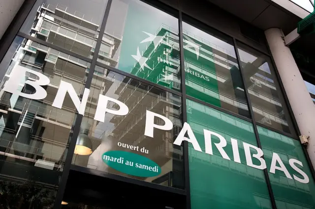 A picture taken on April 14, 2012 in Paris, shows the entrance of a BNP Paribas bank