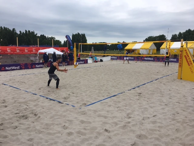 Jersey's beach volleyball players in action