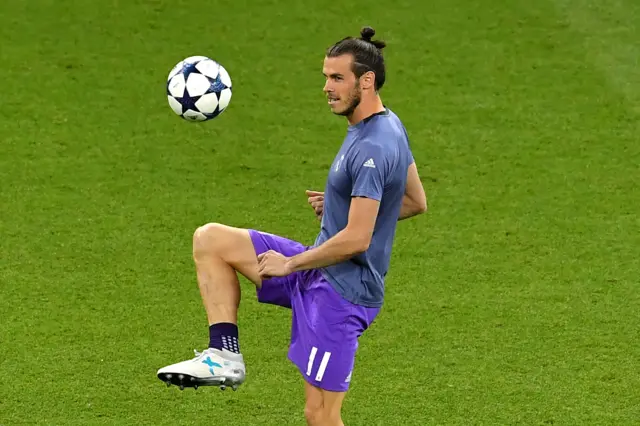 Gareth Bale warms up