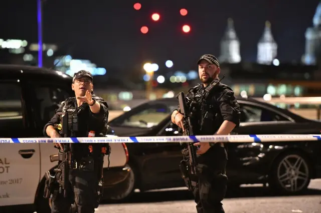 Armed Police officers on London Bridge