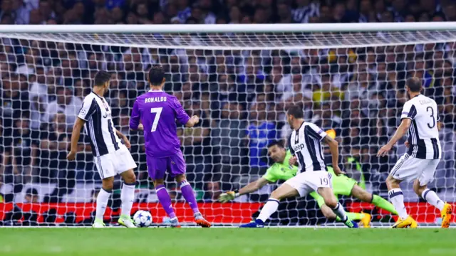 Cristiano Ronaldo of Real Madrid scores the opening goal